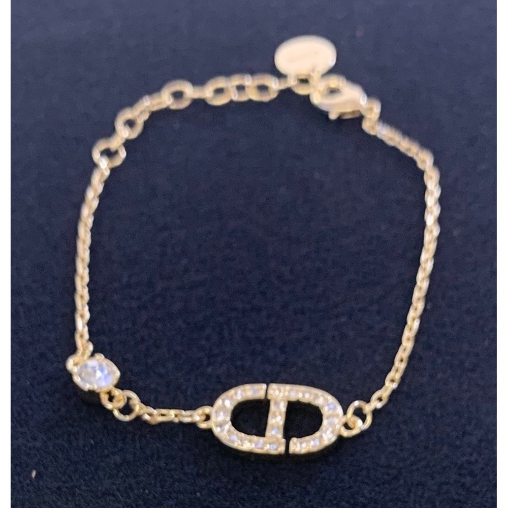 Christian Dior Clair D Lune Gold Tone Crystal CD Logo Bracelet Adjustable